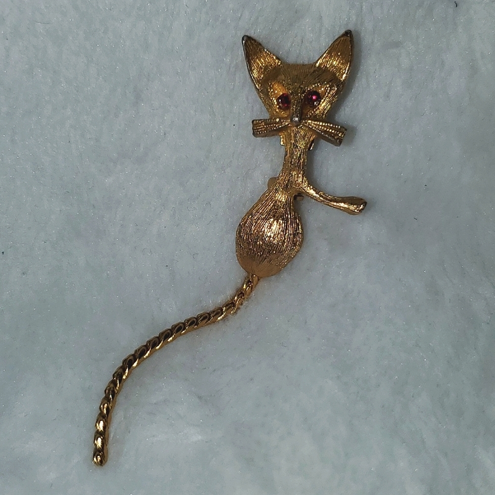 Vintage MCM Gold Tone Cat Brooch with Red Rhinestone Eyes and Flexible Tail